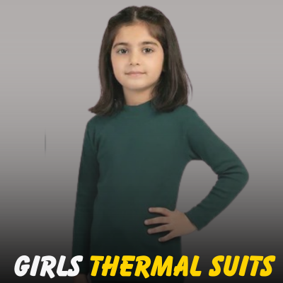 A young girl wearing a dark forest green long-sleeved thermal top from Nazz Collections.